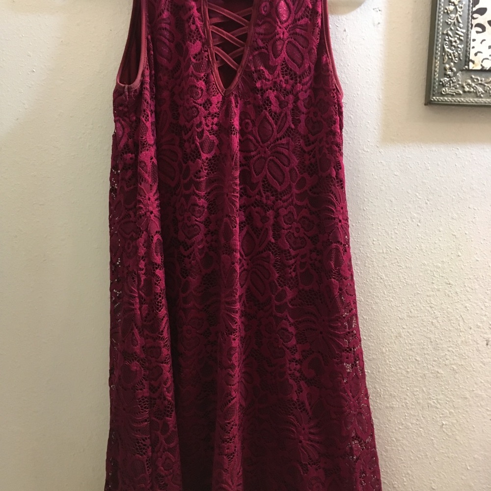 A burgundy lace dress